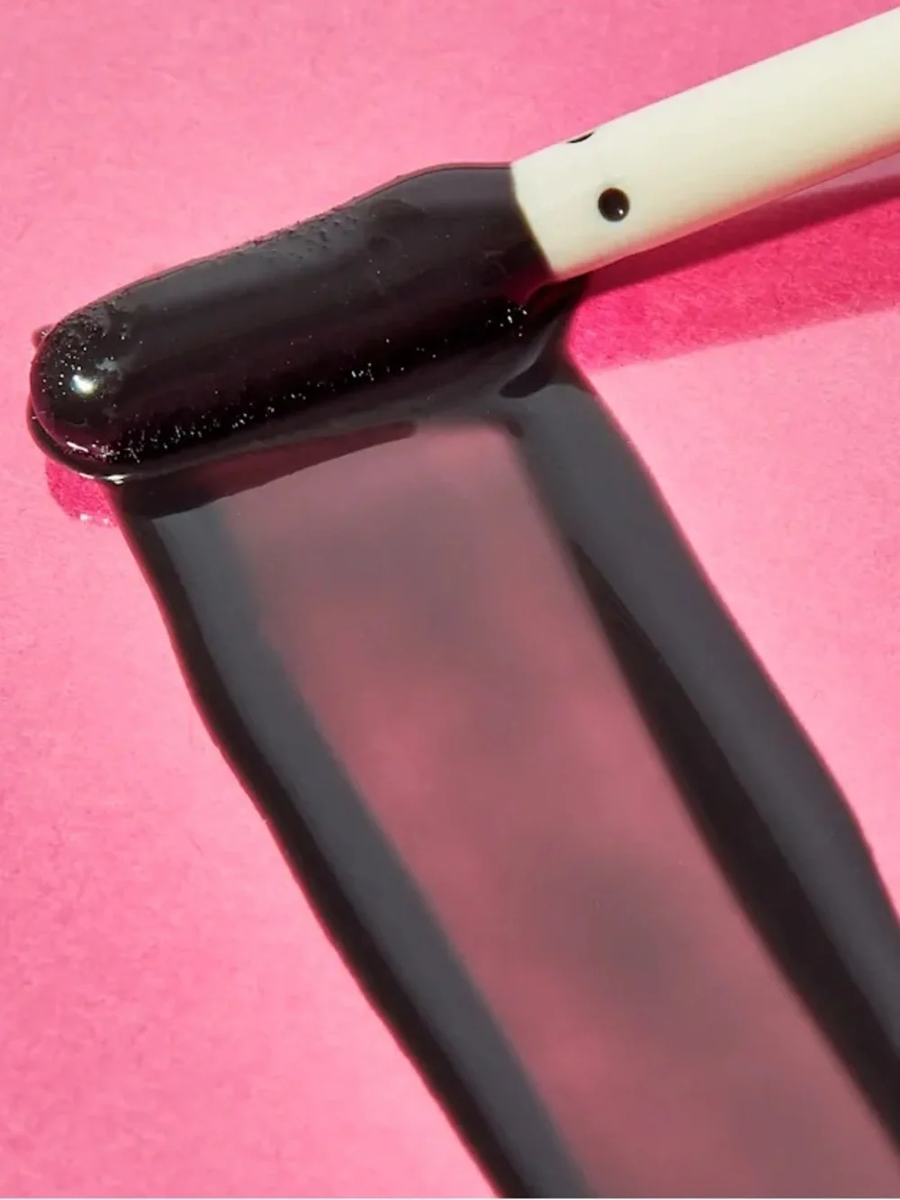 Jeffree Star The Gloss Midnight Lick - sheer to medium black tint (Discontinued)